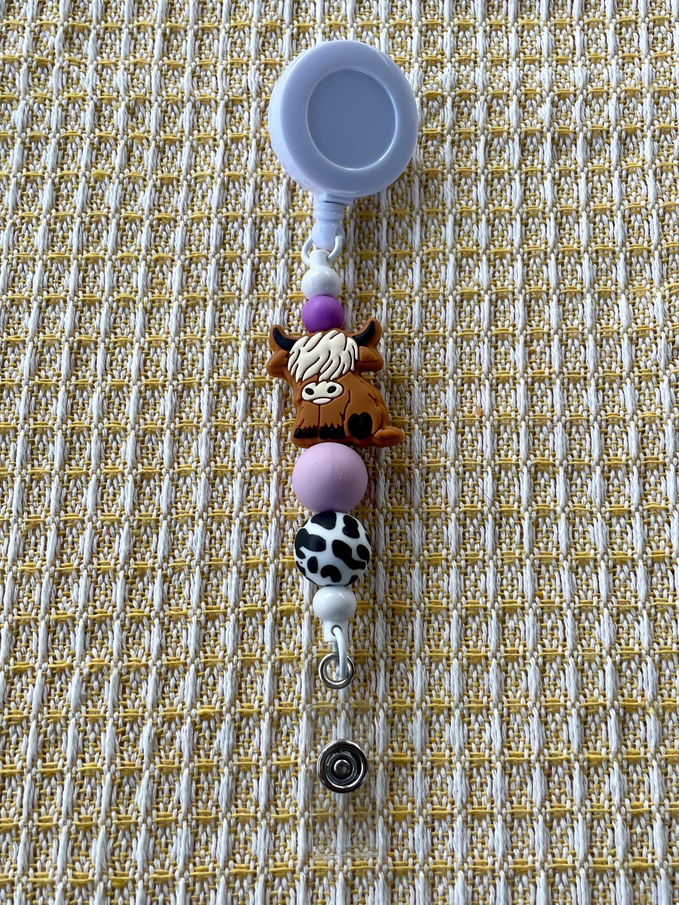 Purple Highland Cow Charm Beaded Badge Reel
